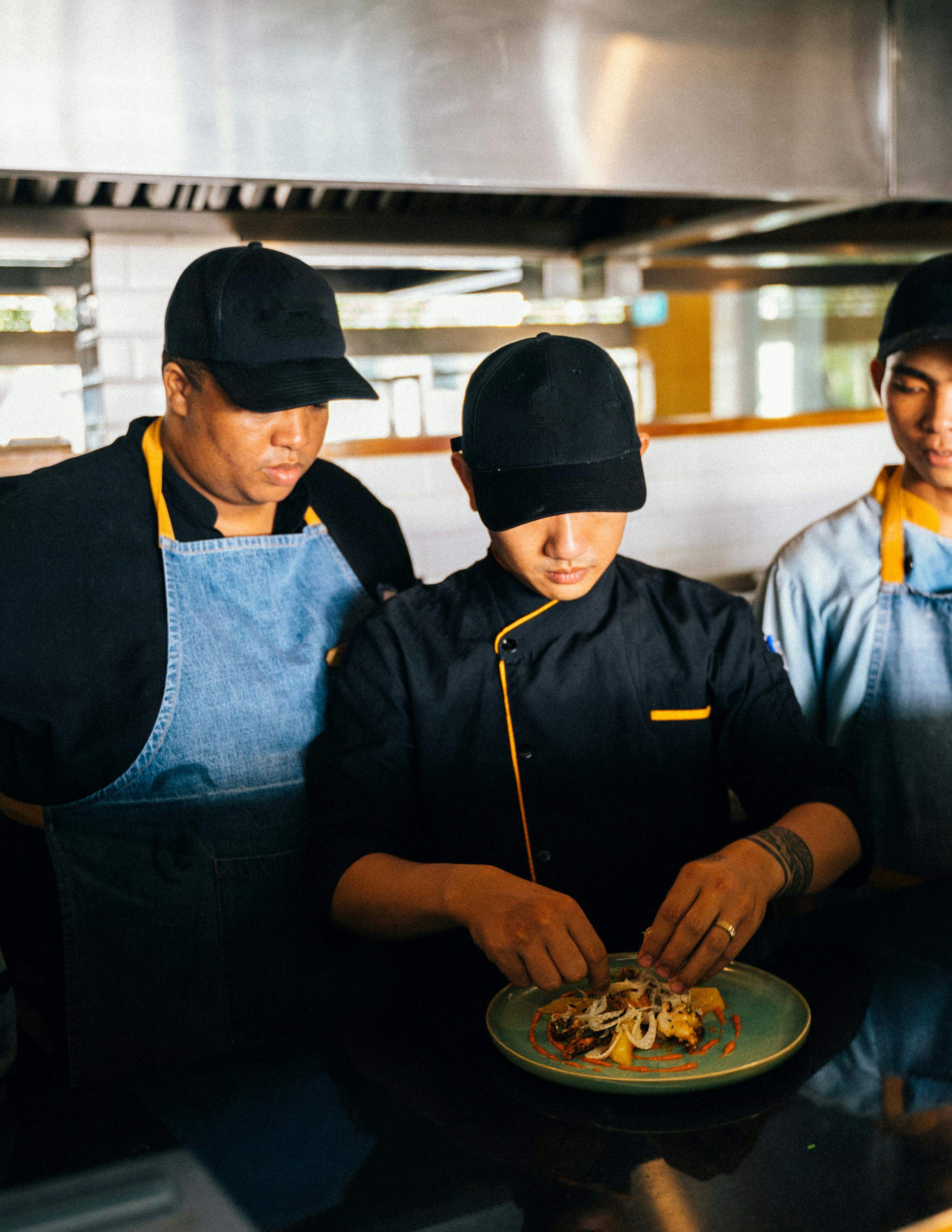 Chefs working in kitchen
